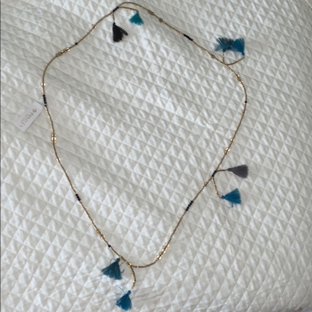 Long gold and tassel necklace